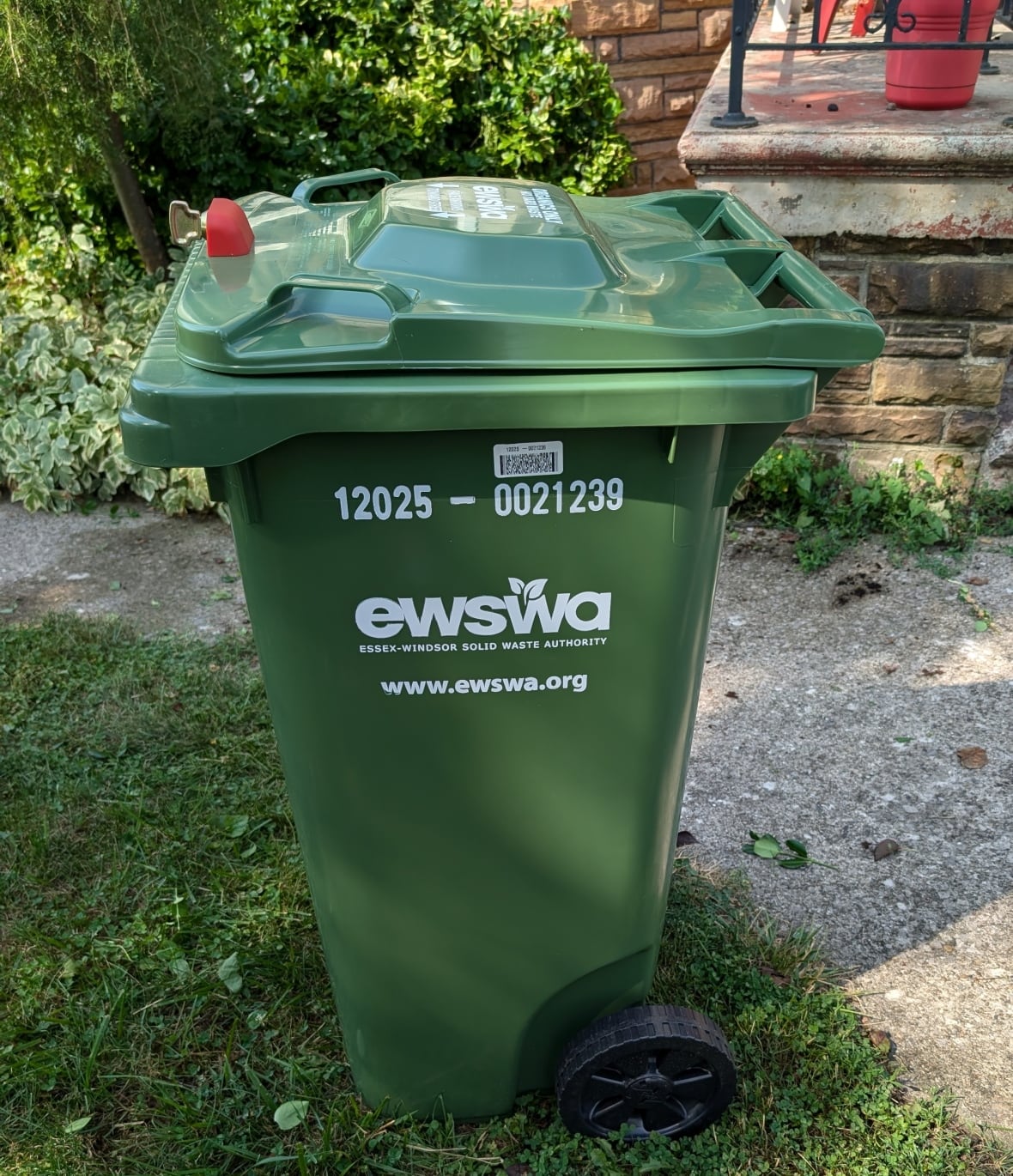 A side view of an organics green bin distributed across Windsor-Essex.