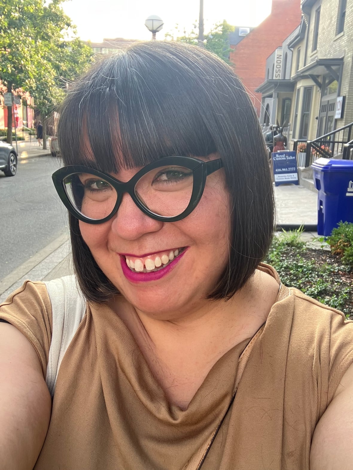 A woman in spectacles.