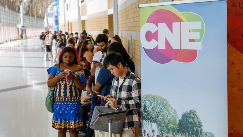 line of people applying for summer job at CNE