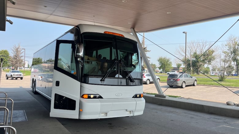 A bus in a parking lot