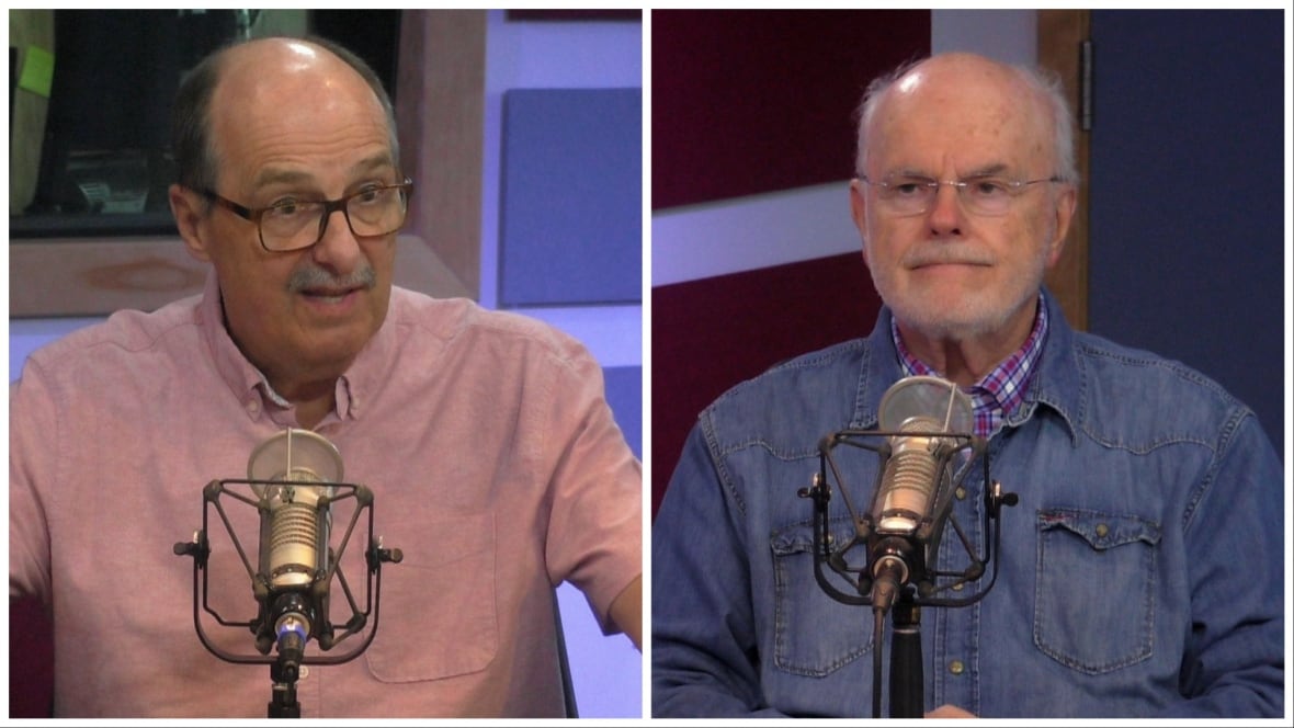 Two men sit in front of radio microphones.