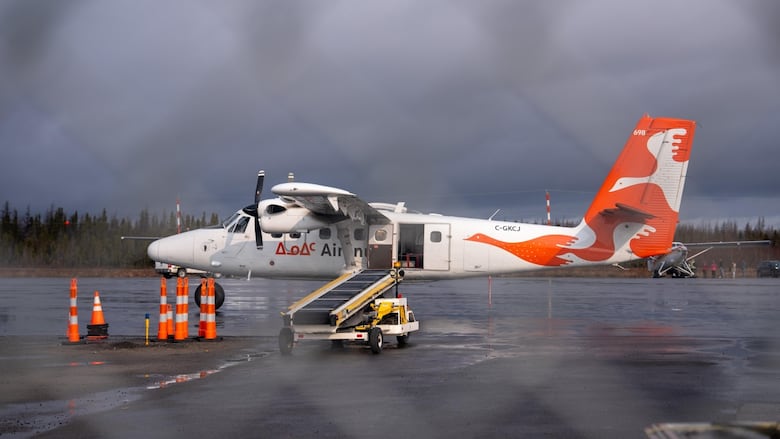 An airplane on a tarmac.