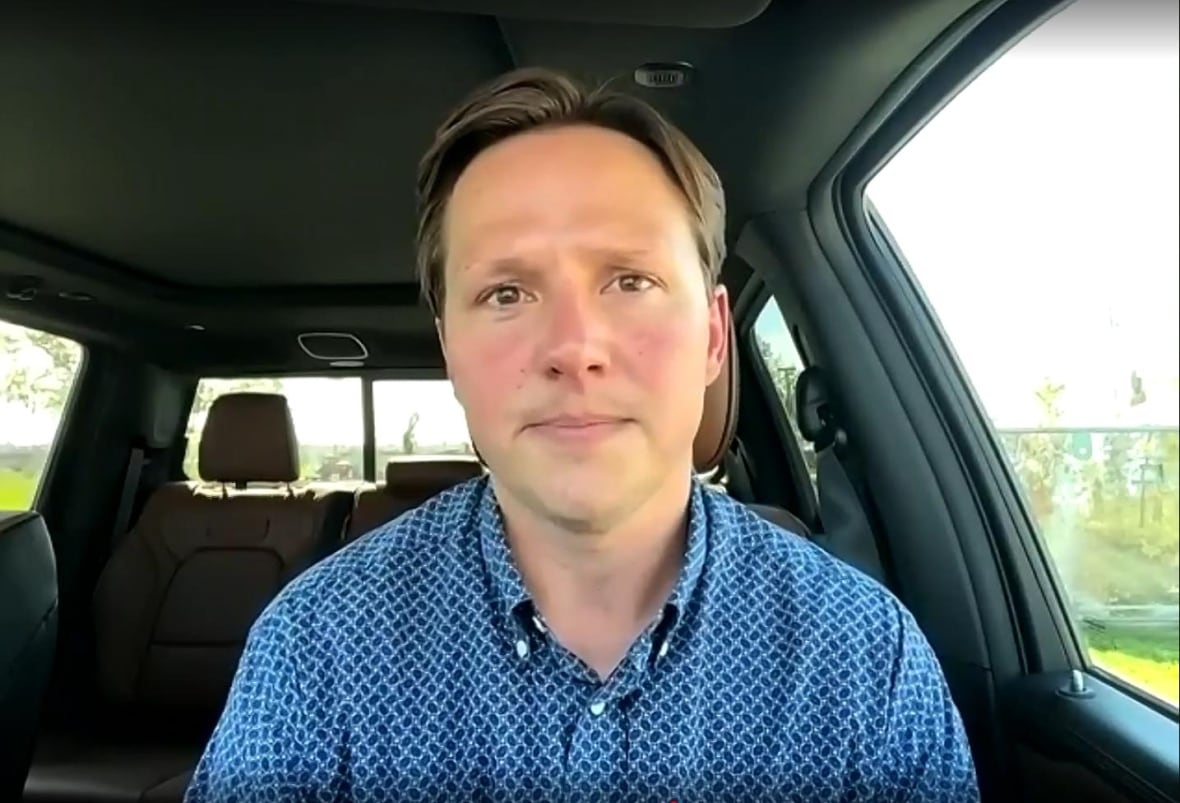 A man in his front seat
