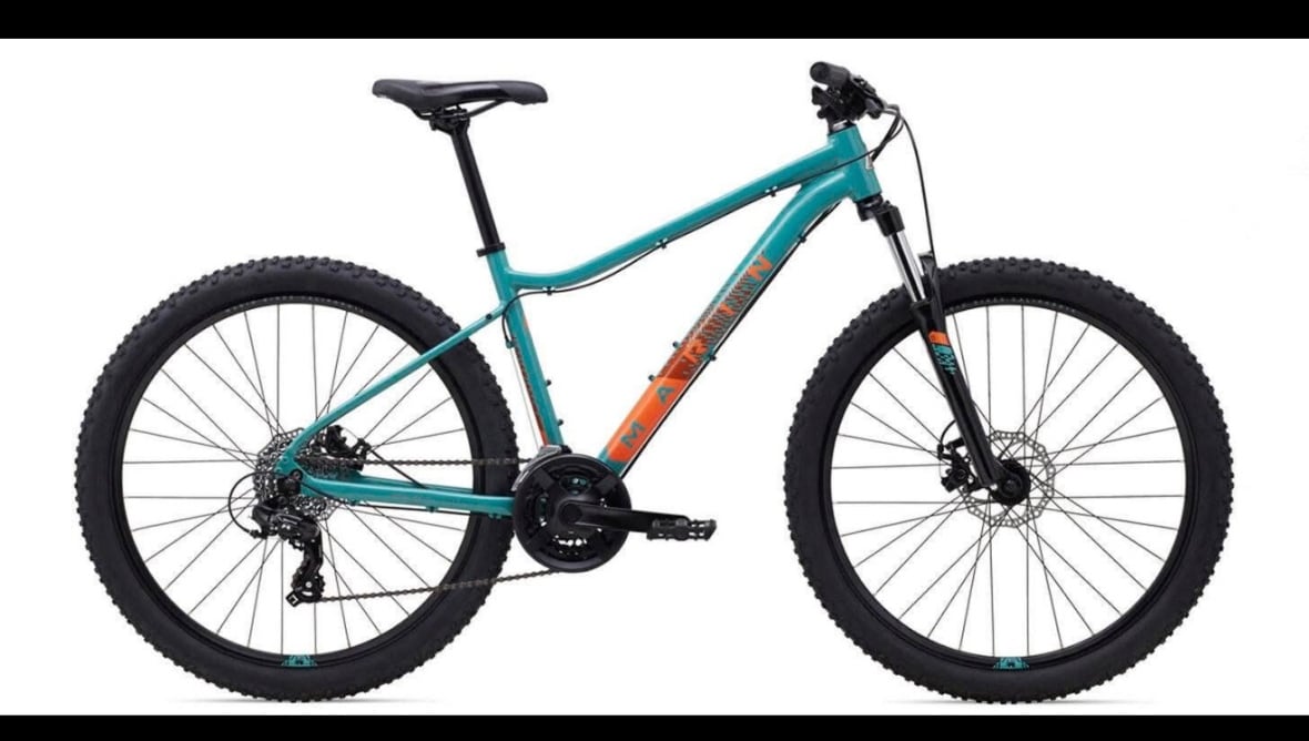 A picture of a teal and orange bike.  