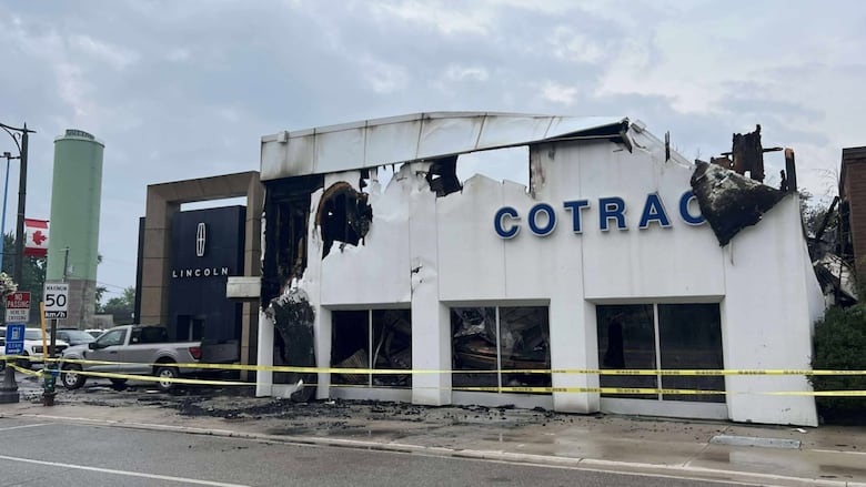 Fire crews arrived at the Currie Road property within minutes on Wednesday night, and found the sales centre of the dealership fully engulfed in flames — the start of a blaze that would last several hours and force the temporary evacuation of some nearby residents.