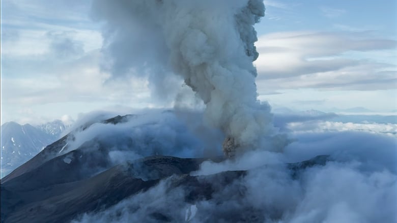 A volcano erupts.
