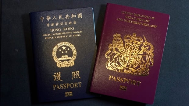 Passports are pictured on a table.