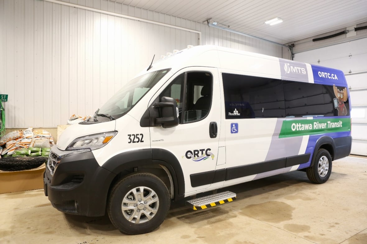 One of Pembroke's on-demand transit vehicle's sits in a garage.