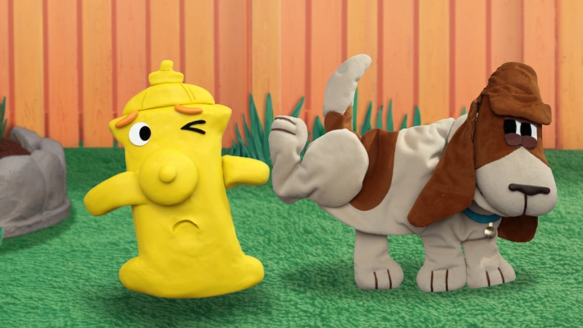 A cartoon yellow fire hydrant winces and flinches away from a dog raising its leg as if to pee on the hydrant. 