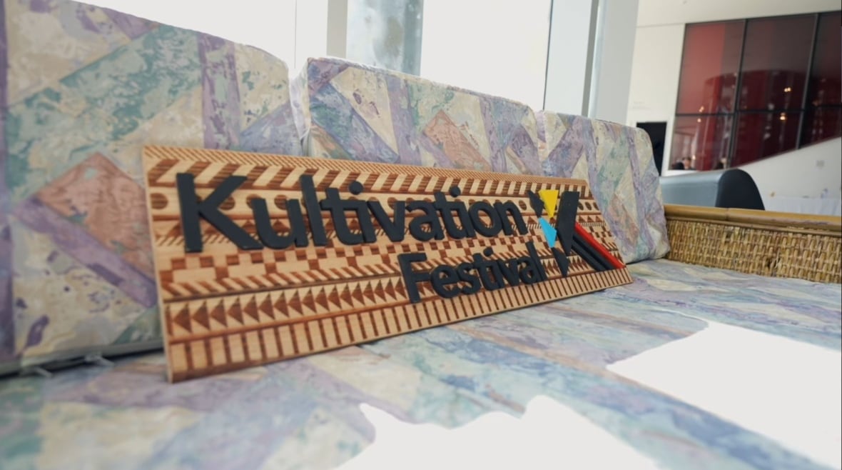 Sign reading "Kultivation Festival" is featured on a colourful background