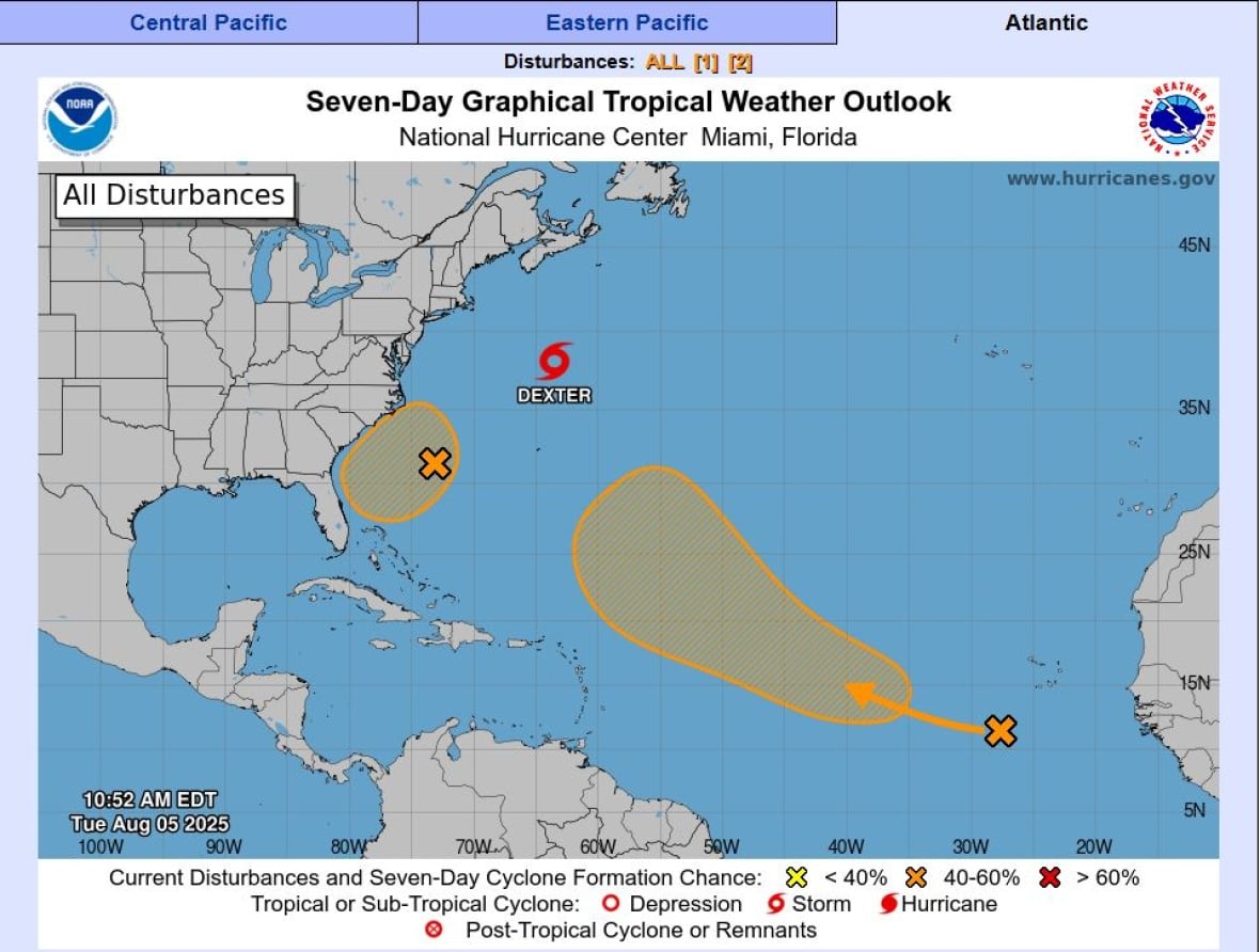 A map of the Atlantic Ocean shows a red swirl that represents Tropical Storm Dexter, and two areas marked in orange that mark where tropical storms may develop.