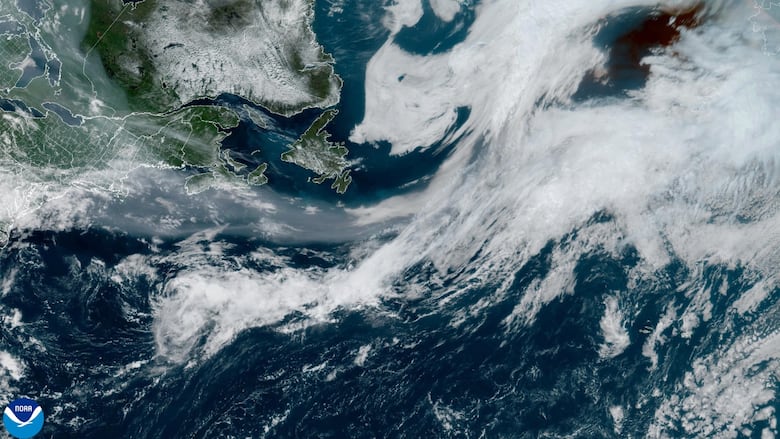 A map shows the North Atlantic Ocean, including parts of eastern Canada and clouds.