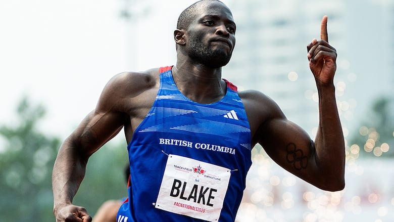 Canadian sprinter Jerome Blake celebrates winning the senior men's 200-metre final at the Canadian Track and Field Championships in Ottawa on August 3, 2025. 