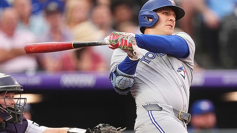 Toronto Blue Jays centre-fielder Daulton Varsho hits a two-run home run off Colorado Rockies starting pitcher Anthony Molina in the fourth inning of a August 5, 2025 MLB regular-season game in Denver.