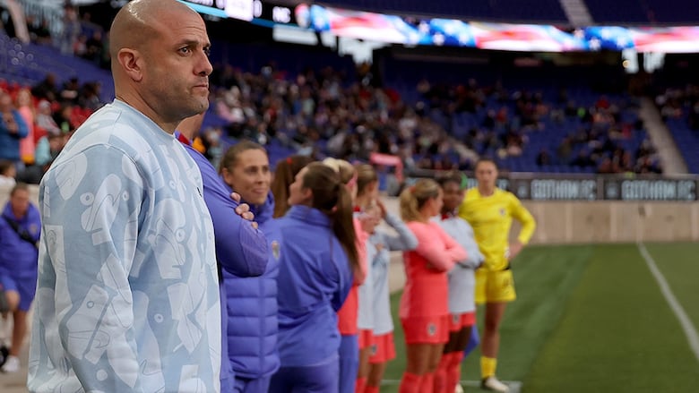 North Carolina Courage head coach Sean Nahas looks on during the national anthem before a National Women’s Soccer League regular-season game against NJ/NY Gotham FC at Red Bull Arena on May 4, 2024 in Harrison, New Jersey. 
