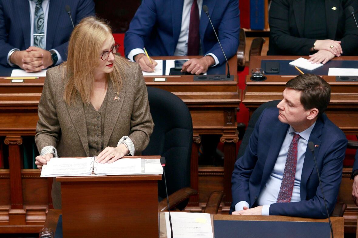 Premier David Eby looks on as Minister of Finance Brenda Bailey tables her first budget in the legislative assembly at legislature in Victoria, B.C., on Tuesday, March 4, 2025. 