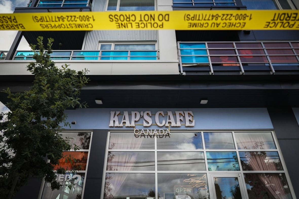 The police tape surrounds Kap coffee in Surrey, BC, after it was attacked by shooting for the second time in less than a month.