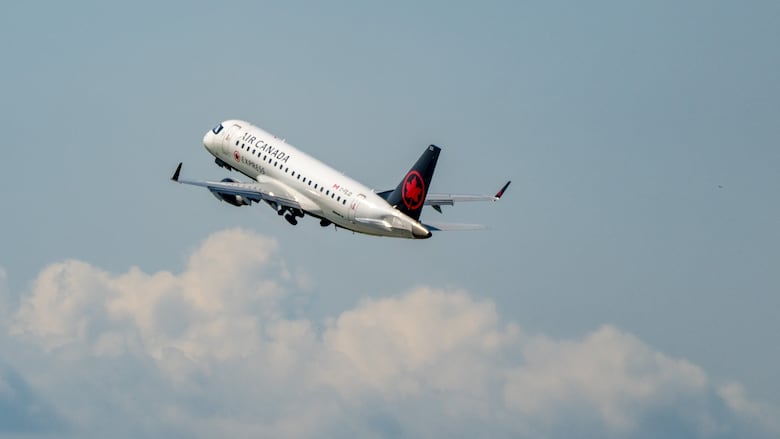 A plane flies up through the sky. 