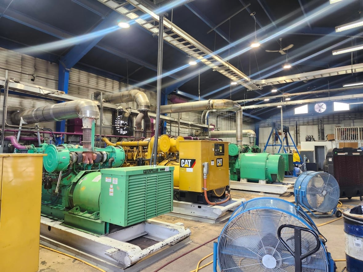 Diesel generators in an industrial warehouse.