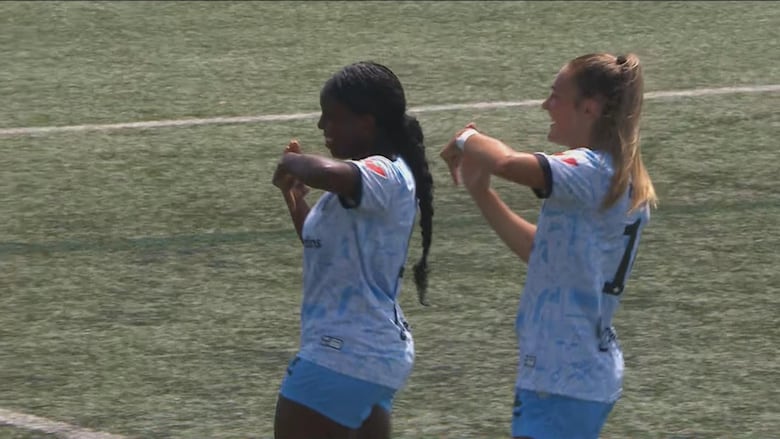 Two female soccer players 