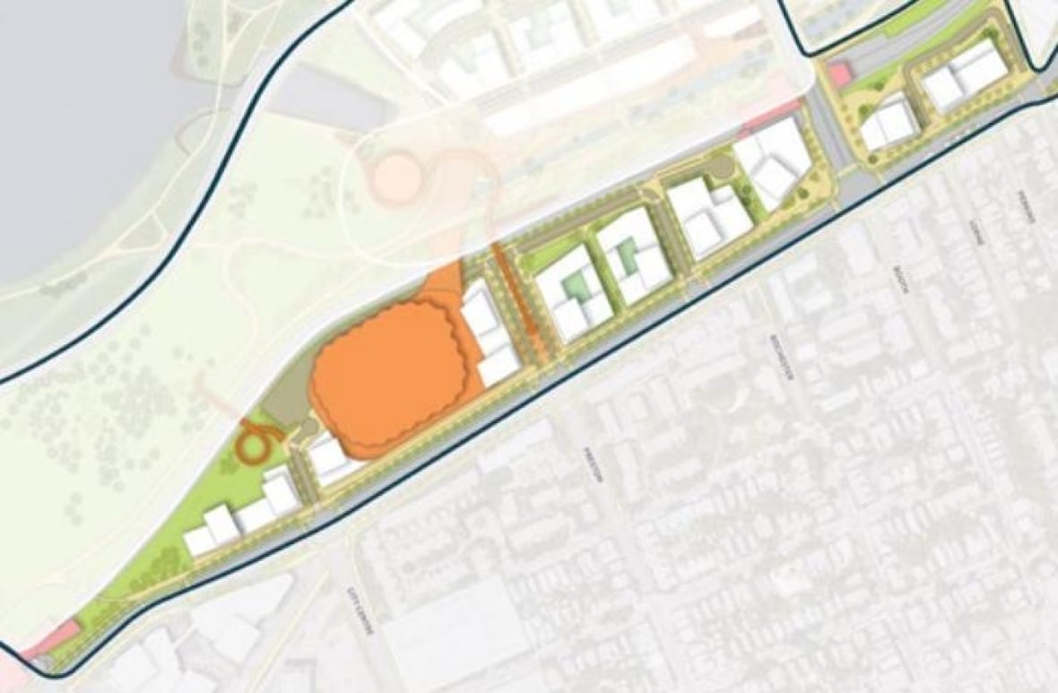 Un óvalo naranja en un parque de la ciudad marca el lugar donde se planea construir un