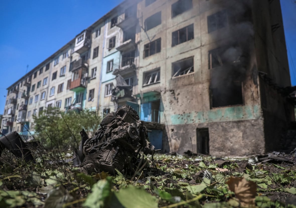 A Russian drone engine is located near a residential building struck by a Russian drone strike, amid Russia's attack on Ukraine, in the town of Biluzerk in the Donetsk region, Ukraine on August 10, 2025. 