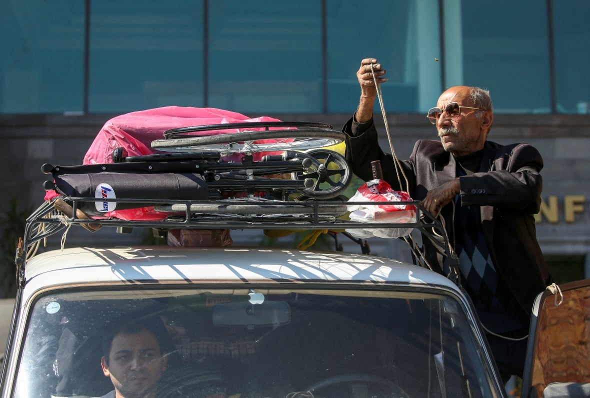 A man who was loading a car. 