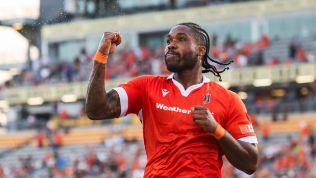 Forge FC player celebrating a goal