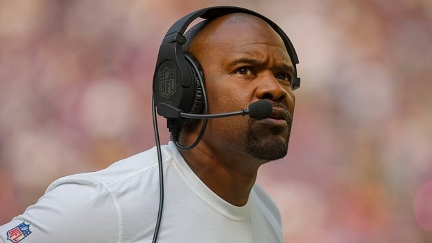 Minnesota Vikings defensive co-ordinator Brian Flores looks to the scoreboard in the first half of a National Football League regular-season game against the visiting Houston Texans on September 22, 2024 in Minneapolis. 