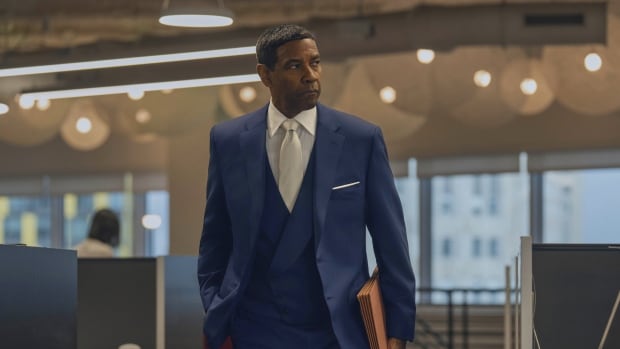 A man in a suit and carrying a folder is shown. 
