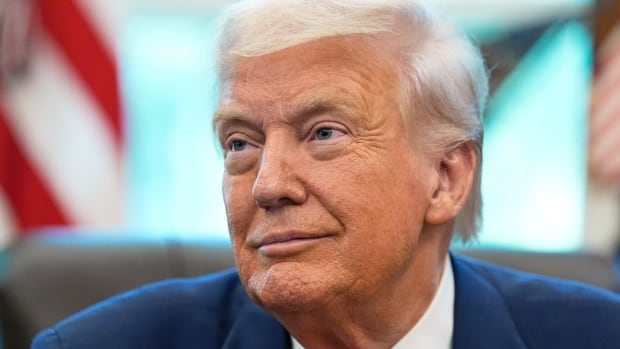 President Donald Trump listens during an event in the Oval Office to mark the 90th anniversary of the Social Security Act, Thursday, Aug. 14, 2025, in Washington.