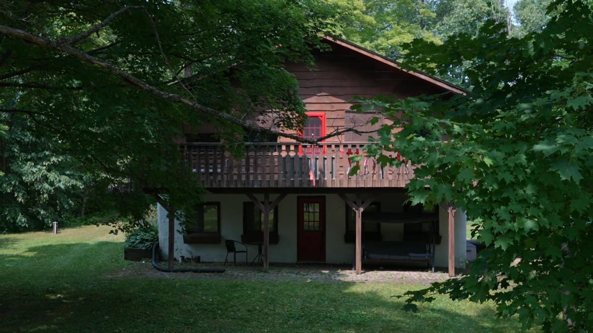 A cottage with wooden siding in Calabogie, Ontario.