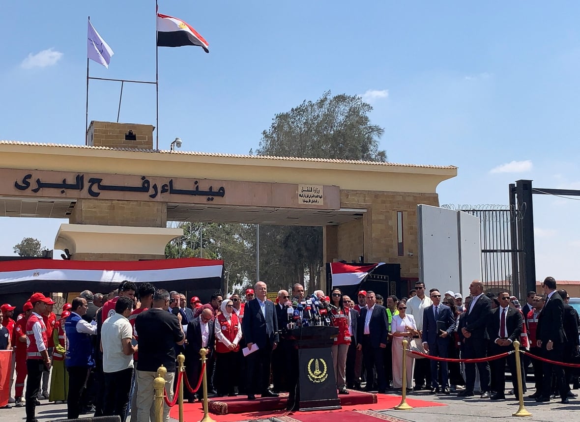 Egyptian Foreign Minister Badr Abdelatty and Palestinian Prime Minister Mohammad Mustafa attend a news conference at the Rafah border crossing.