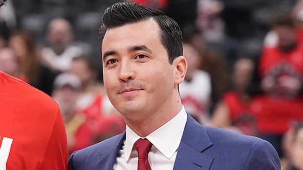 Toronto Raptors general manager Bobby Webster stands on the basketball court before a February 14, 2024 NBA regular-season game against the visiting Indiana Pacers.