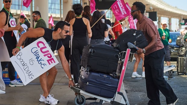 Air Canada flight attendants' union says it will risk jail time to strike for a better deal