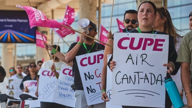Travellers walk  Air Canada formation  attendants connected  onslaught   astatine  Pearson International Airport successful  Toronto, connected  Monday, Aug. 18, 2025.