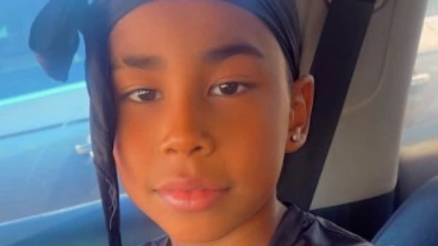 Dozens call for more action on gun violence after Toronto boy killed by stray bullet | CBC News