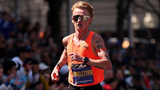 Rory Linkletter of Canada crosses the decorativeness  enactment     of the 129th Boston Marathon connected  April 21, 2025 successful  Massachusetts. 