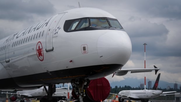 A plane is shown on the tarmac.