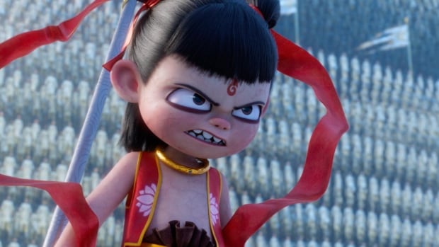 A grimacing animated child surrounded by floating ribbons is shown.