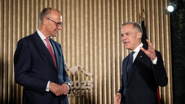 Prime Minister Mark Carney meets with German Chancellor Friedrich Merz ahead of the G7 Summit at the Pomeroy Kananaskis Mountain Lodge, approximately 100km west of Calgary, in Kananaskis, Alta., Sunday, June 15, 2025.