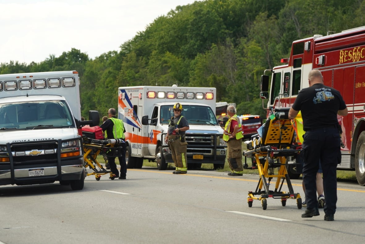 Rescue employees were seen at work on a crash site on Friday near Pimberruck, New York