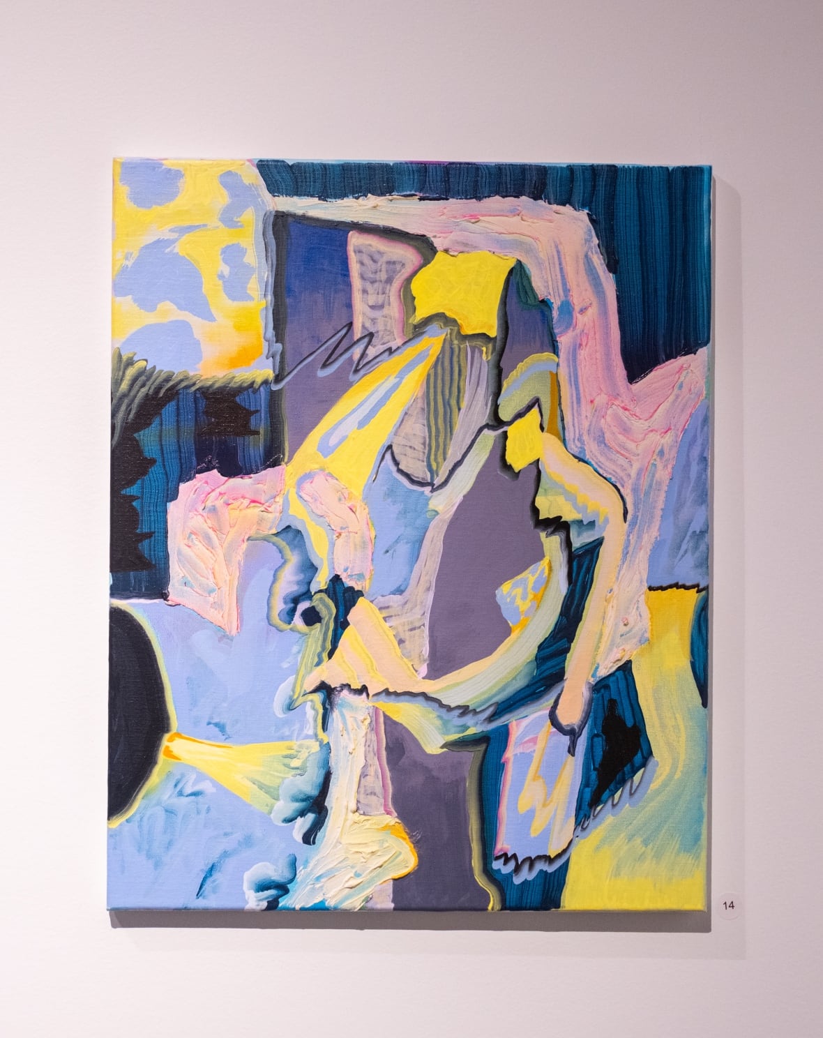 The abstract paintings looks like a jigsaw puzzle of fragmented forms, coloured in yellows, blues, pinks and black.