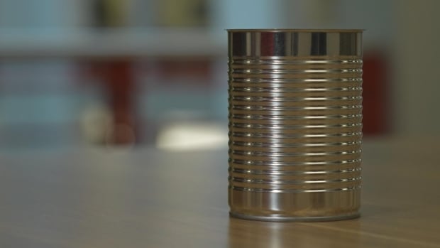 A ridged metal can is shown.