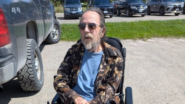 John Laramie says he was surprised to learn he would be facing an assault charge after an altercation with another resident.