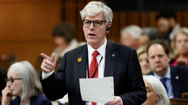 A Minister pointing a finger. 