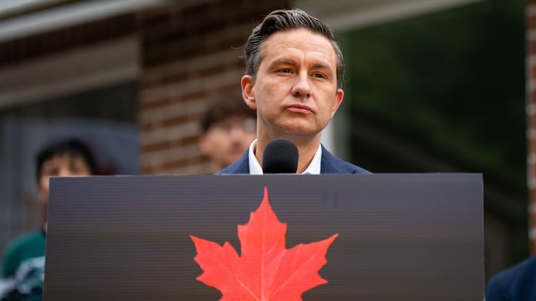 A man is on a podium.
