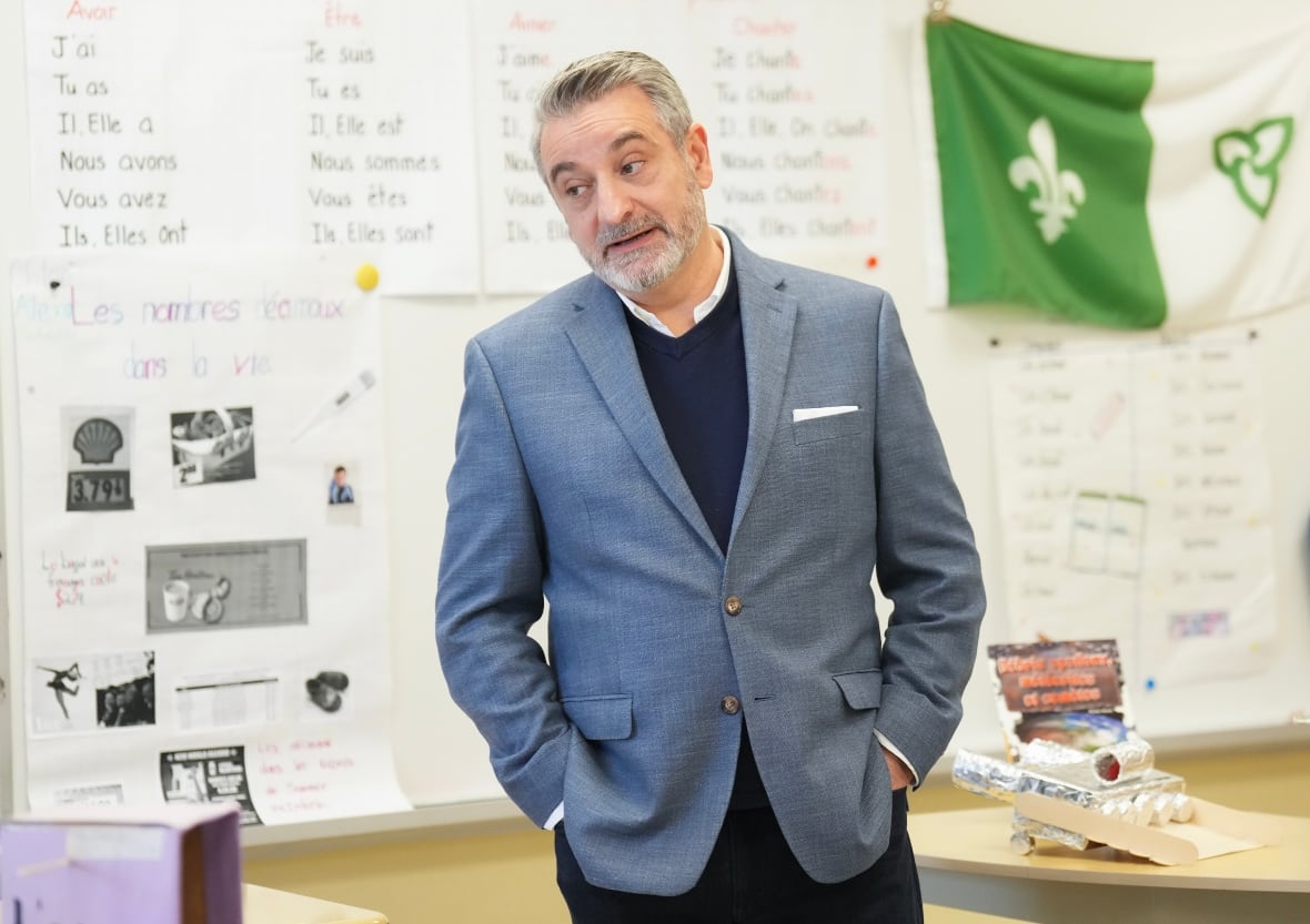 Ontario Minister of Education Paul Calandra visits students in the classroom at École Catholique Pape-François school in Stouffville, Ont.