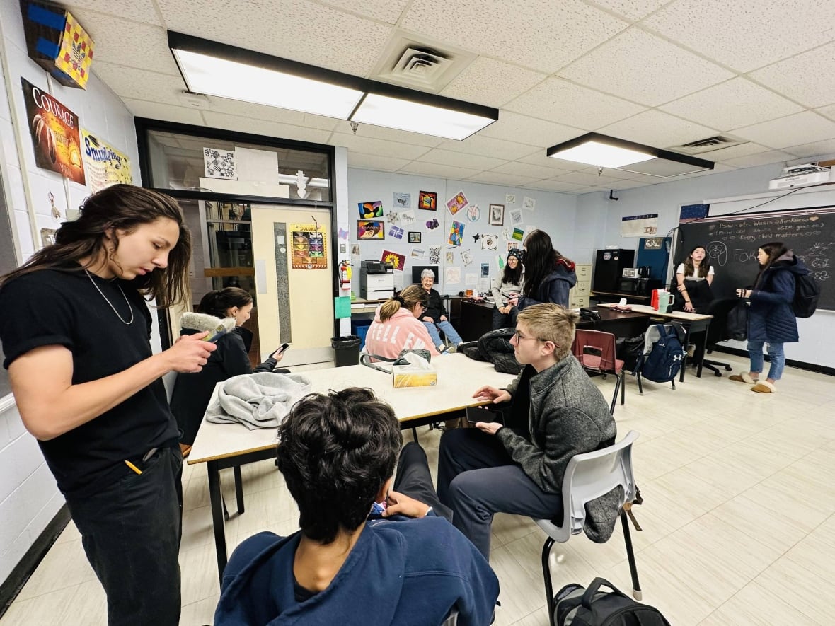 high school students in a classroom.
