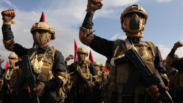 Houthi fighters take part in a weekly anti-Israel rally in Sanaa, Yemen, Friday, Aug. 29, 2025. (AP Photo/Osamah Abdulrahman) Fighters marching